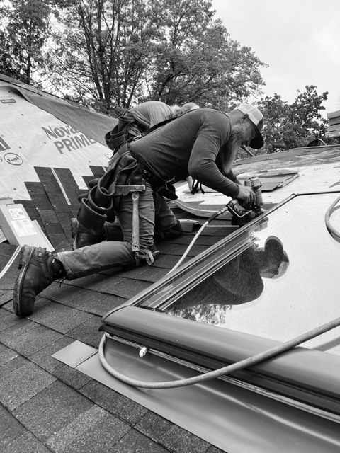JN Roofing and Contracting employee doing a Reroof