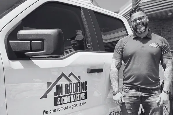 JN Roofing and Contracting Truck and Employee